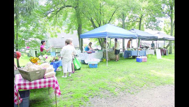 Christina Lindstrom Photos In its second year, the Stockholm Farmer's Market offers fresh, local goods to consumers. The market sets up on Friday evenings in the alley behind Sandy's Clothing and Gifts to coincide with the Stockholm Merchants' Market Friday events.
