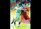 Maddie Schmoker fights for position in the second half of W-K’s game Tuesday night against Fillmore Central. 