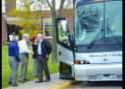 Regional Event and Conference Center board members Don Jacoby (left) and Jane Glander, as well as National Eagle Center executive Director Rolf Thompson, greet the state senators upon their arrival to Wabasha Tuesday.—Photos by Michael Smith