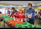 Members of the Court St. Charles Catholic Daughters spent their Saturday morning filling Christmas baskets with goodies, which they later delivered to local residents. Above are Fran Goodrich and Deb Rowekamp. 