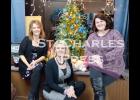 Amy Brown, Heidi Peterson and Becki Burt welcome guests to their Holiday Open House at Amy’s Salon 211 in Eyota on Friday evening. 