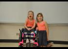 Anna Zarins and Maggie Avery often dress alike—an extension of their special friendship that has blossomed over the past year. Out of that bond has also come an effort to help the Zarins family obtain a wheelchair-accessible van to make going places with Anna easier.