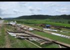 The twister then struck a steel machine shed (below), hurling debris onto Hwy. 88 and across a field.