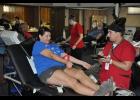 Korrina Bauer chatted with an American Red Cross worker as she finished up donating blood for the eighth time. The bloodmobile, held July 12, was scheduled to see about 36 donors.