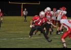 Junior Jed Lorenz ducked past Colfax defenders and broke several tackles en route to a 72-yard touchdown run in the third quarter. Lorenz had three touchdowns in the game as the Cardinals kicked off their season with a big 46-8 victory.