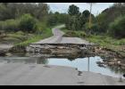 Most roads around Buffalo County have now received temporary fixes to reopen to traffic, with a few exceptions. This section of Sand Road just west of Gilmanton caved in during the flood and remains swamped by water. Town board chair Marvin Meier said last Thursday it may never be fixed.
