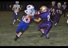 Junior Shane Van Roo pushed through an attempted tackle by a Durand player as Mondovi began to gain an advantage in the third quarter. Van Roo found the end zone three times against Durand, helping lift Mondovi to a 34-22 DSC win on Friday night, Sept. 4.