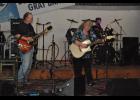 Candyce Gray, Roger Larson and drummer Bob Holden prepped for their performance, which drew hundreds of fans to The Valley for a 7+ hour concert featuring different combinations of past band members.