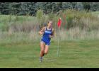 Senior Maddie Gilbertson rounded a turn on the Mondovi course. Gilbertson was in first for the Mondovi girls as the squad hosted its annual invite at The Valley.