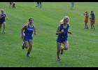 Sophomore Emily Flaskrud flew up the steep hill at the end of the race, looking to pick off a few runners.