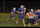Senior quarterback Greg Poeschel looked for running room as Mondovi worked its way up the field. Poeschel ran in what looked to be the game-winning touchdown for Mondovi with 44 seconds remaining in the game.