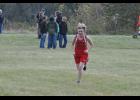  The lone runner for the E-S girls, Annabelle Vikingson grinned as she approached the finish line.
