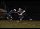  Junior Boe Olson looked for running room on a kick return.