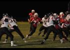 Junior Quinn Olson found a hole in the C-FC defense for a big gain in the third quarter. Olson scored three touchdowns against the Pirates and ran for 184 of the Cardinals’ 399 yards as a team.