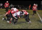 Jake Matchey (12) and Cade Kunferman (10) brought down C-FC’s Conner Turnbell.