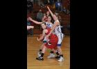 Sophomore MaKayla Saul looked for an outlet after grabbing a defensive rebound as Mondovi players pressured in the backcourt.
