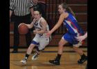 Sophomore Carly Buchholz looked to drive the baseline.