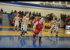 Senior Josie Olson tracked down a loose ball in the paint.