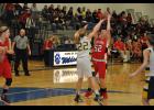 Abagail Palkowski looked to make a move against Mustangs player Erika Simmons.