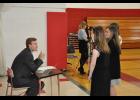 Senior Mathew Higley asked questions after judging a student group’s website. History teacher Chad Hanson said students whose own NHD projects advanced to the regional and state levels in the past were selected to judge this year’s projects, allowing them to “take on a leadership role” with younger students. History Club officers also participated as judges to help select regional qualifiers.