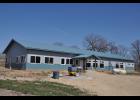 With most of the exterior at the Buffalo County Humane Association’s permanent shelter building finished, construction tasks continue with interior finish work. BCHA President Brenda Gruber says patience with the project’s lengthy timeline will pay off by way of significant cost savings. Hiring a general contractor could have run the BCHA up to double the cost of what they expect to spend on the building, which Gruber hopes to see completed sometime this fall.