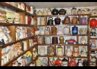 The cookie jar collection is quite prominent in Yarrington’s home, filling floor-to-ceiling shelves in her dining room and a porch/work room. She plans to begin taking appointments in January for interested buyers to view her cookie jars in order to begin downsizing.
