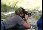 Fernholz, shown here in prone position, traveled to five 4-H shooting competitions around the state in 2015 to earn qualifying points.