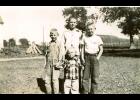 Gary Preston (center front) is pictured on the farm with his three older brothers (left to right) Lynn, Chuck and Butch. The photo was taken by their neighbor, Janice Mikelson, now of Mondovi.