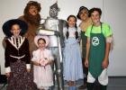 Grace Pichler was joined on stage in The Wizard of Oz by her siblings (front, left to right) Alivia, Anna and Ben Pichler, who also earned roles in the production. Here the siblings posed with the Cowardly Lion, Tin Man and Scarecrow.