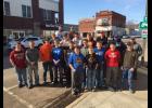 A group of Mondovi football players and coaches volunteered their time at Mondovi’s Anytime Fitness on Saturday, March 3. Kendra Edwards said she appreciated the assistance and planned to donate to the football program in return.