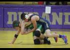 Mondovi’s Bryce Johnson looked to gain the upper hand over his opponent.