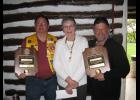 Mondovi Lions Club members Rob Ganschow (left) and Paul Woebbeking (right) were recently honored with the Melvin Jones Fellowship award for their contributions locally and to the Lions Clubs International Foundation. Presenting the special recognition to the two Mondovi men at a recent Lions Club meeting was Anita LeCleir (center), a past president of the organization.