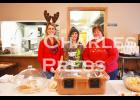 Tracy Pietrzak, Sammy Pietrzak and Sue Thompson serve lunch at the St. Charles Moose Lodge on Saturday.