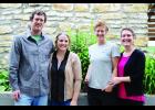 Matthew Smith  and his wife,  Marcy Smith, along with Matthew’s sister, Amber Smith, and her wife, Anne Magratten, are the new owners of the Stone Barn. Photo by Laura Berndt 