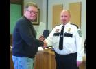Wabasha City Council President Steve Schmidt administers the Oath of Office to new Police Chief Joe Stark, who was appointed in November after former Chief Jim Warren resigned to become the Chief Deputy for the Sheriff’s Department, at a Special Meeting last Wednesday morning. 