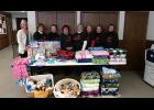 The Zion Quilters recently presented needed items to Buffalo County’s Drug Endangered Children (DEC) program. This donation and others like it are divvied up into bags that are given to children when they are removed from a home where drugs are present. Pictured, Buffalo County social worker Amy Reggin (far left) accepted the donation from Zion Quilt Group members (left to right) Cheryl Anibas, Bev Brion, Mary Brion, Audrey Aase, Ginny Gunderson, Cheryl Schreiner and Dorothy Urness. Not pictured—Vicki Denk.