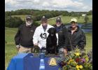 Randy Spangler of Mondovi and his dog “Mully” recently claimed their first National Amateur Championship title at the 2017 NARC event, held in rural Mondovi. Pictured with Mully and his championship hardware are, left to right, Dean Reinke from Purina, handler/owner Randy Spangler, trainer Wayne Curtis of Fox Hollow Retrievers, LLC, and Karl Gunzer from Purina.
