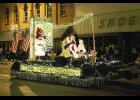 A float makes its way down Main Street during the 2015 Dazzle Day parade. This year's Dazzle Day parade begins at 6 p.m. on Saturday, November 26. Courier-Wedge file photo
