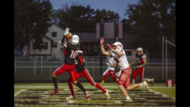 Kevin Williams, no. 10 from WK, intercepts a Cardinal pass into the end zone.