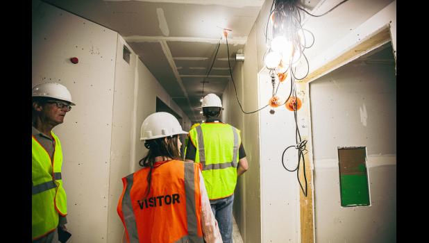 Visitors enjoy seeing the progress made throughout the building.