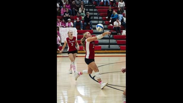 Setter Addisyn Quade hustles for that second touch on the ball to set up her teammates.
