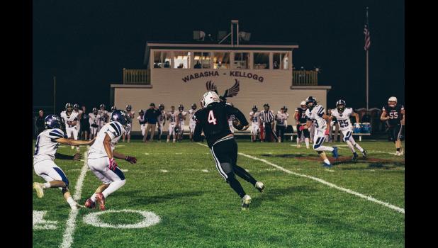 Ender makes a good run with the ball in hand.