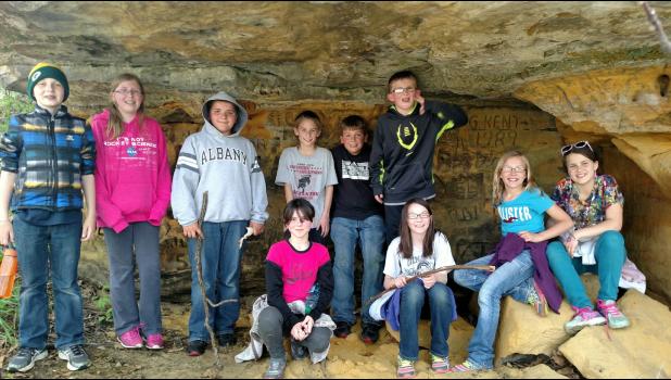Contributed photos Many Gilmanton students wrote their name on the popular cave wall atop of Mount Tom of Gilmanton on May 13. Sitting: Julianna Beggs, Katie Lisowski, Lydia Evans, Katelynn Nelson; Standing: Wyatt Clouse, Morgan Guenther, Zachary Turner, Taylor Jesse, Carson Rieck, Devon Werlein.
