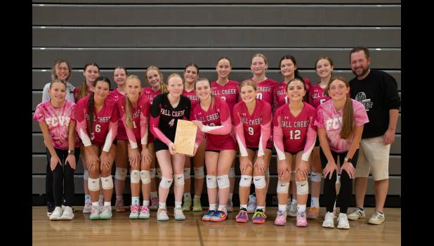 Cricket players and coaching staff pose with the championship plaque for winning the Sparta Invitational back on Sept. 12. Photo courtesy of Fall Creek Sports History Facebook page