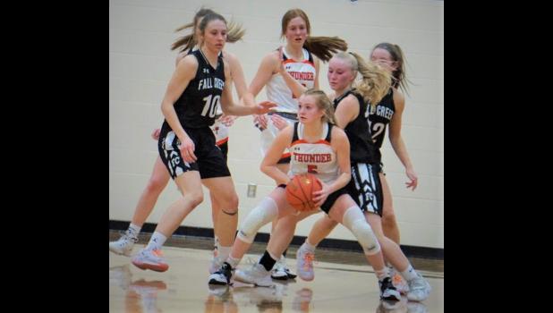 Fall Creek defenders surround Osseo-Fairchild's Dezaray Eisberner during last weekend's regional championship game at Osseo-Fairchild. Photo by Dave Strasburg