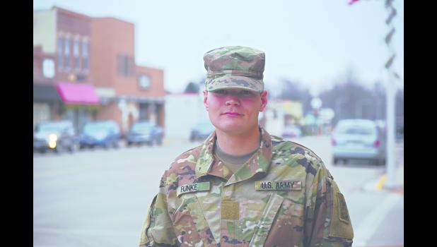 Dakotah Funke, a 2016-17 Plainview-Elgin-Millville High School graduate, stands outside of the Plainview News in uniform on Wednesday, Dec. 20. Funke, who has completed the United State Army’s basic training program, will officially graduate on Jan. 18 and 19. Photo by Michael Flicek