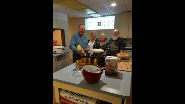 Some of the many kitchen chefs who made the delicious breakfast happen were Dennis and Jan Elfering and Dawn and Dave Kaufman.