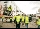 Members of the Port Authority, Wabasha city council, city staff and staff from the development company are led on a tour of the in-progress Alleghany Apartments by developer Andy Baartman of Keller-Baartman Properties.   Photos by Sophie Horgan