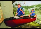 The front of this Wenonah canoe juts right out of the Wildlife Refuge mural on the second floor of the National Eagle Center. It is part of the mural shown on Page 1 this week. 