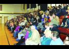 The crowd at Sunday’s Soar With the Eagles Birdman Show at St. Felix Auditorium listens to “The Birdman of Las Vegas.” Though the gym wasn’t quite full Sunday, it was overflowing for Saturday’s programs. 